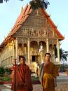  monks at pha that luang tai, vientiane