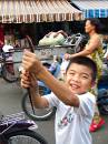  little boy wanted to sell us this living snake, saigon